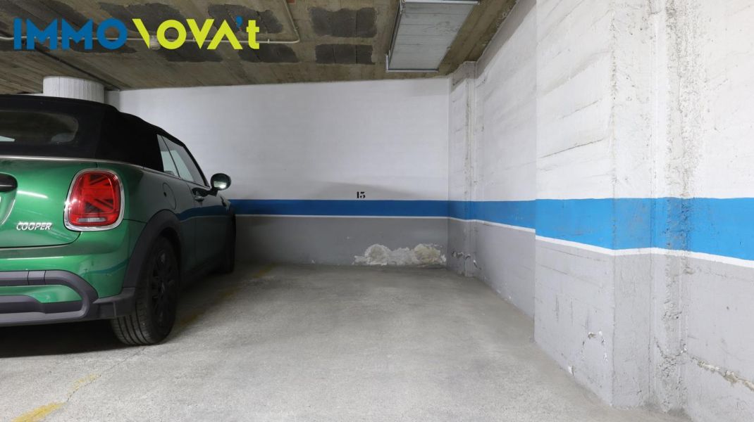 Parking space for a small car in the center.